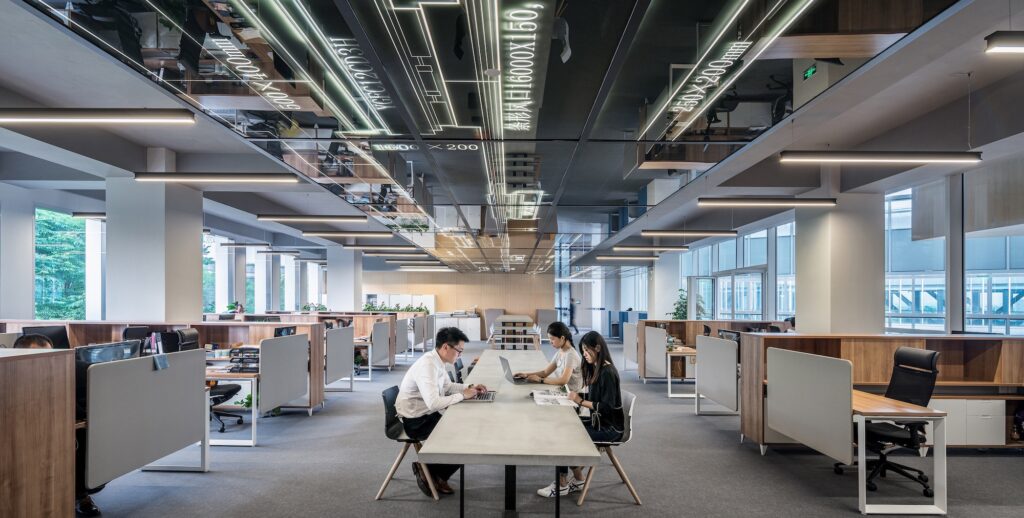 People working in a large modern office