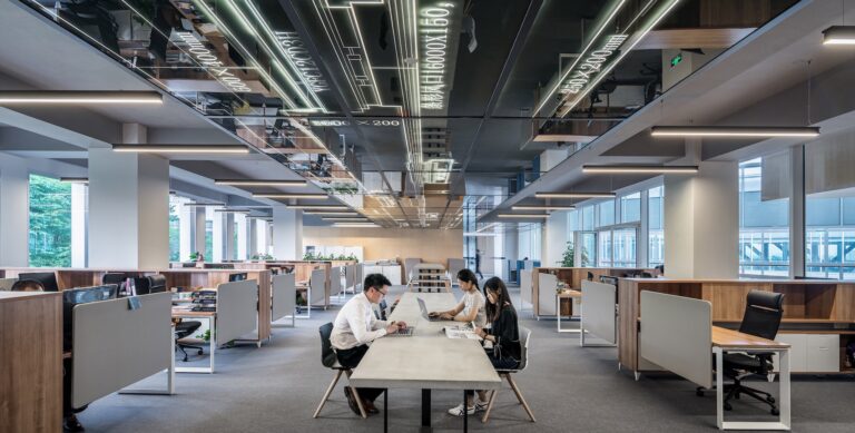 People working in a large modern office