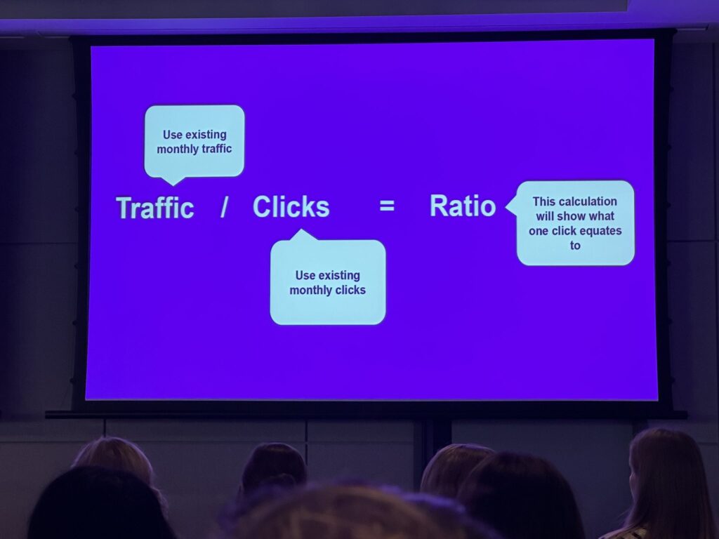 On stage at WTS Fest: Rasida Begum slide on how to calculate what one click equates to